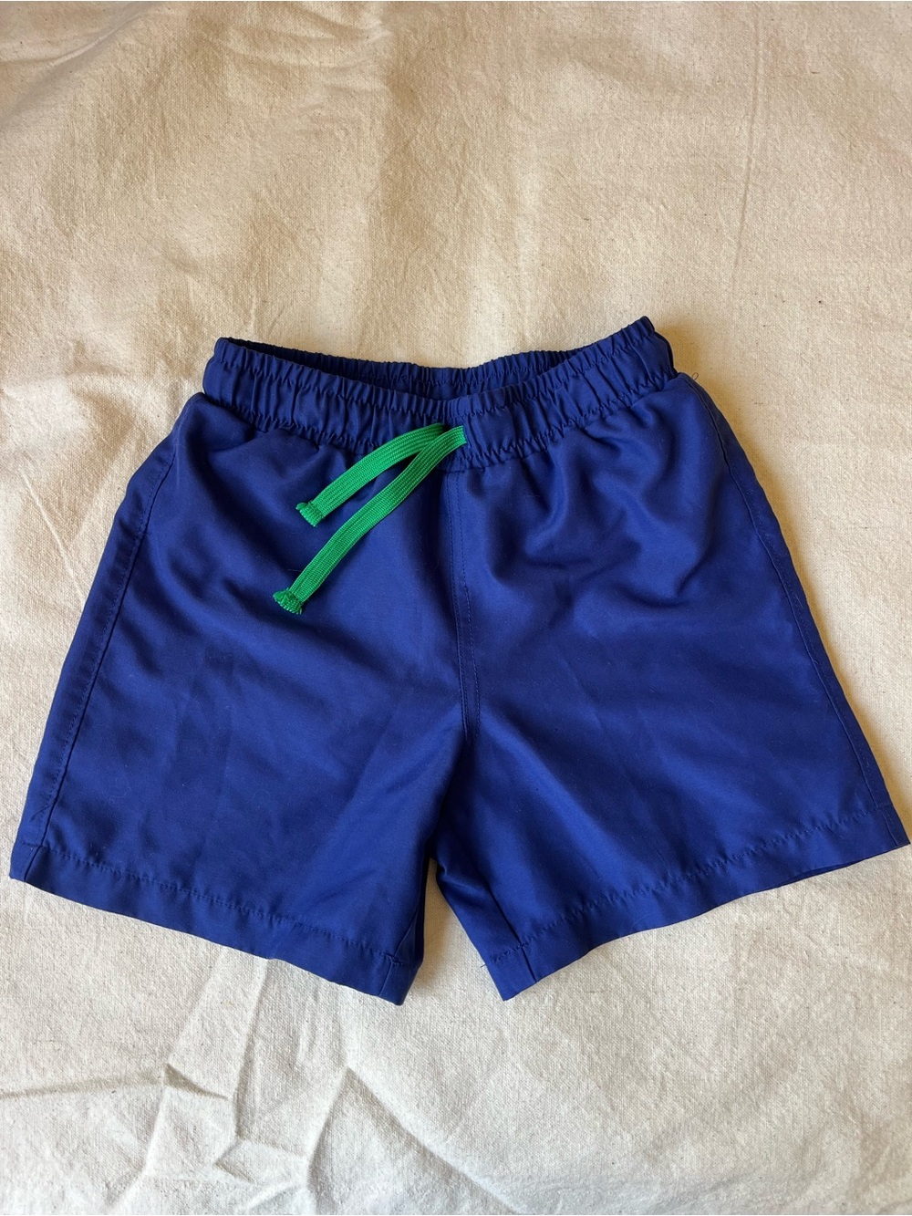 Primary swim trunks blue size 6/7